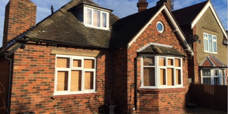 Brick House With White Windows